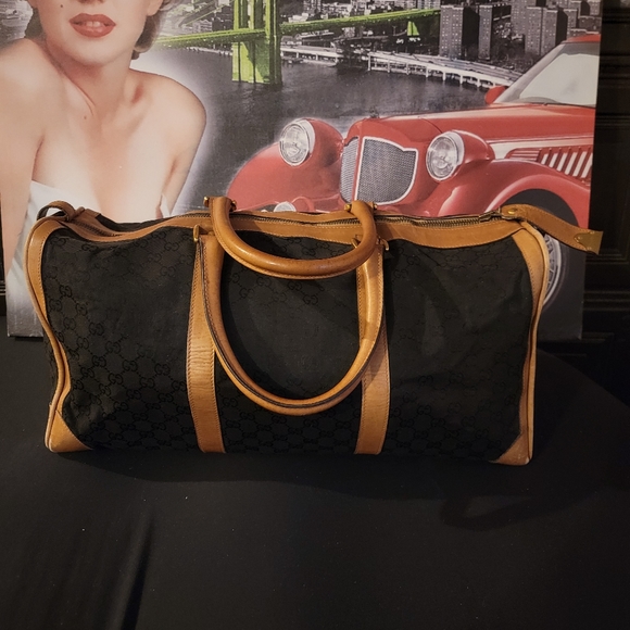 Gucci Other - Gucci GG canvas black tan leather AUTHENTIC Traveling  Carry on Duffle 1970 Rare